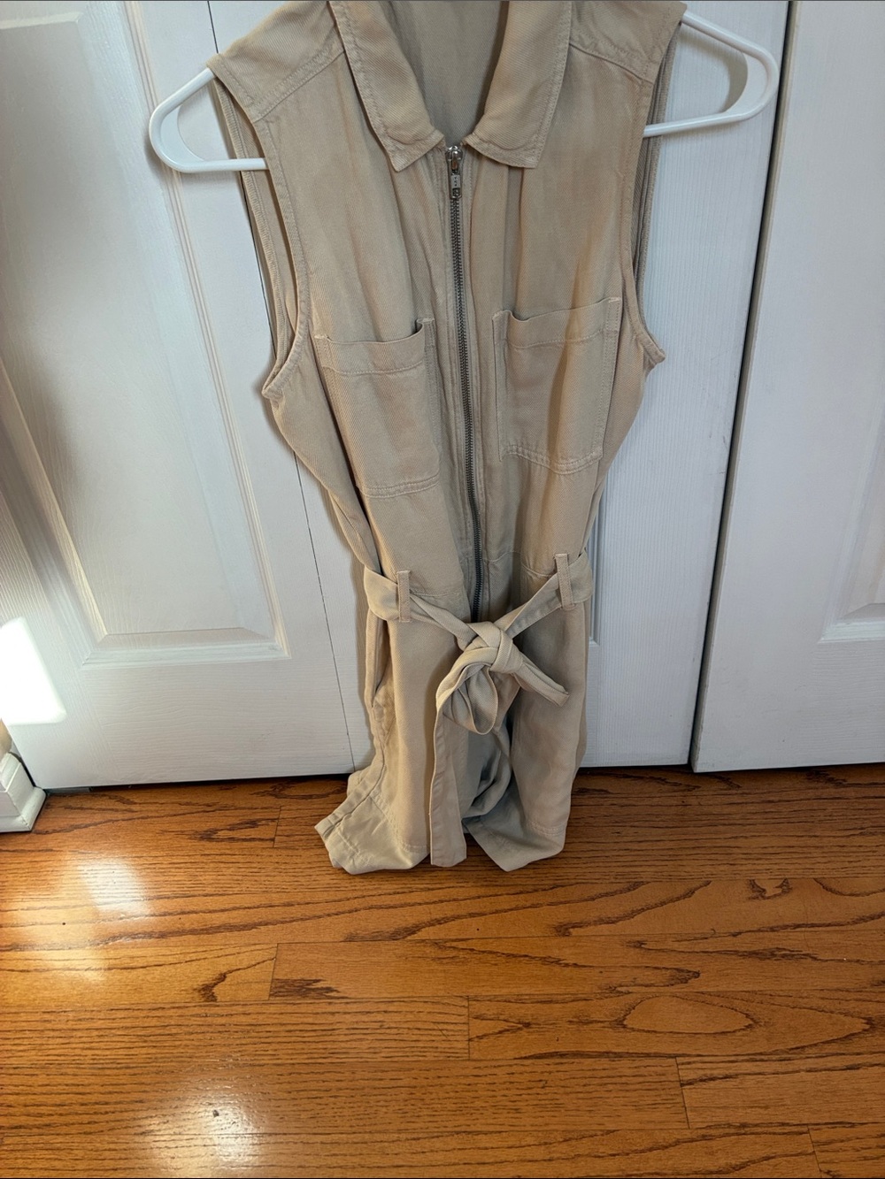 Sleeveless Zip-Front Utility romper in Beige